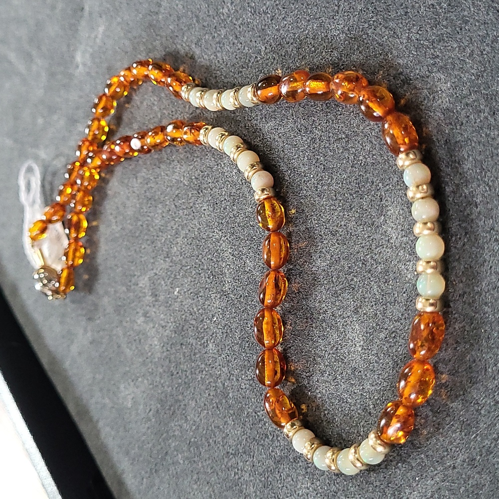 Genuine gold and gemstone necklace